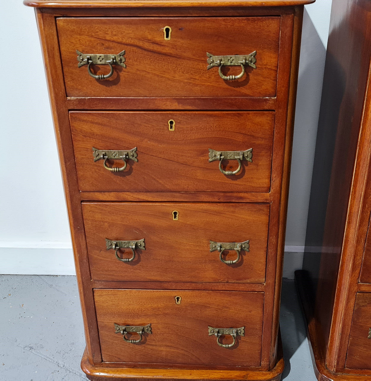 Pair of English Victorian Mahogany bedside drawers. In good original detailed condition.