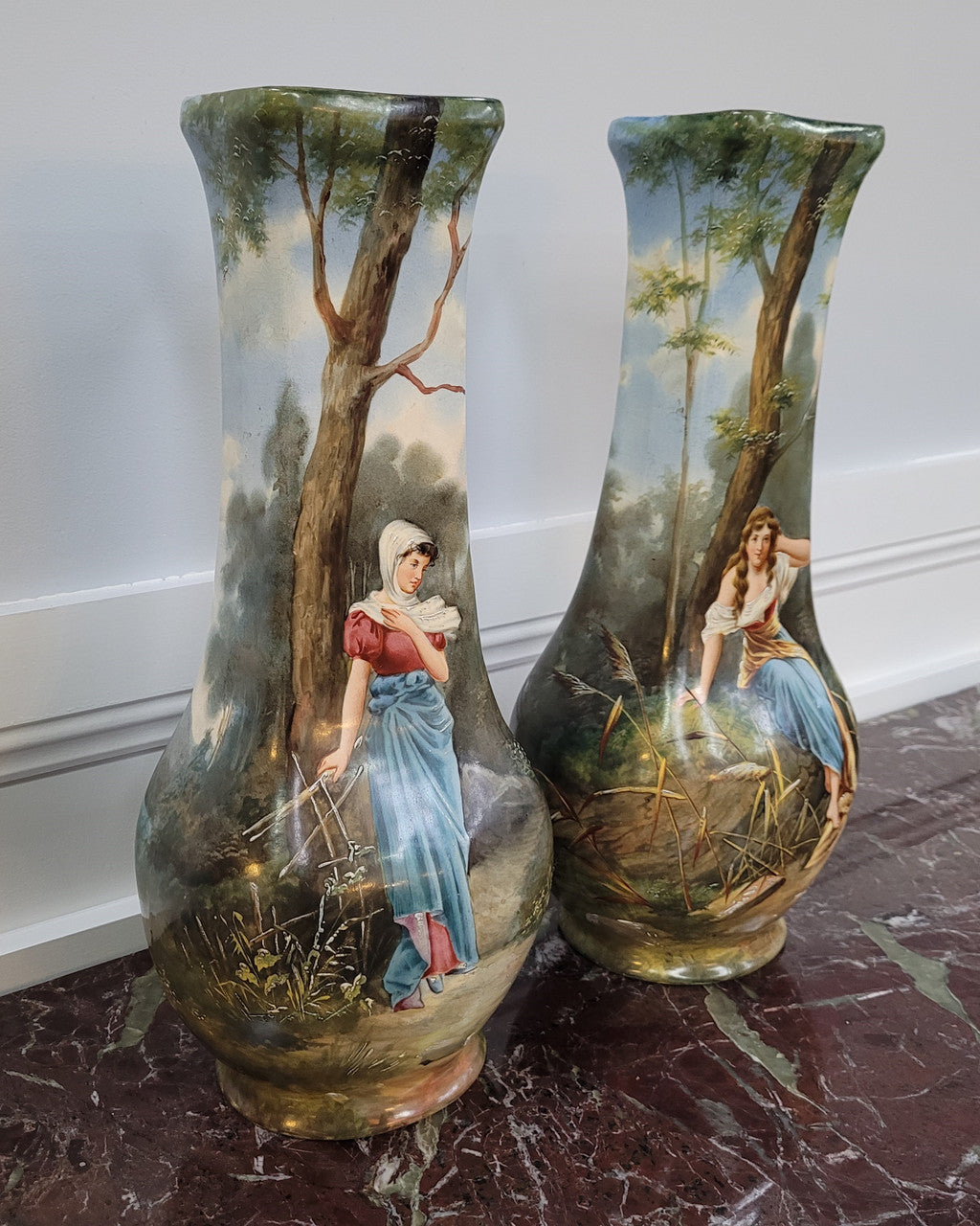 Pair of Victorian hand painted decorative vases depicting women. Please view photos as they help form part of the description.
