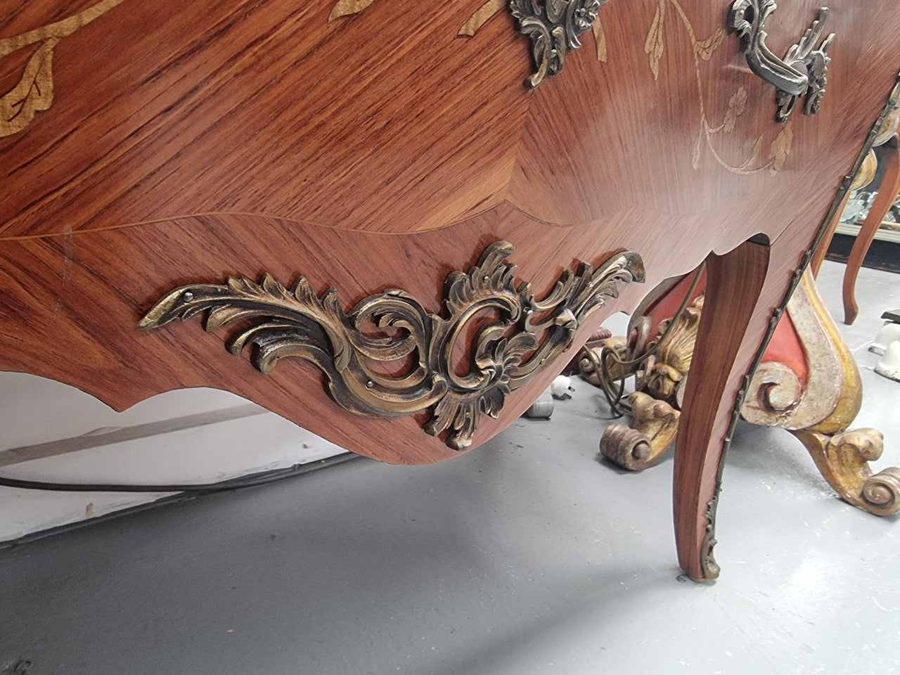 Stunning Louis XV style marquetry inlay marble top two drawer commode. It has decorative ormolu mounts and beautiful marble top. In good original detailed condition.