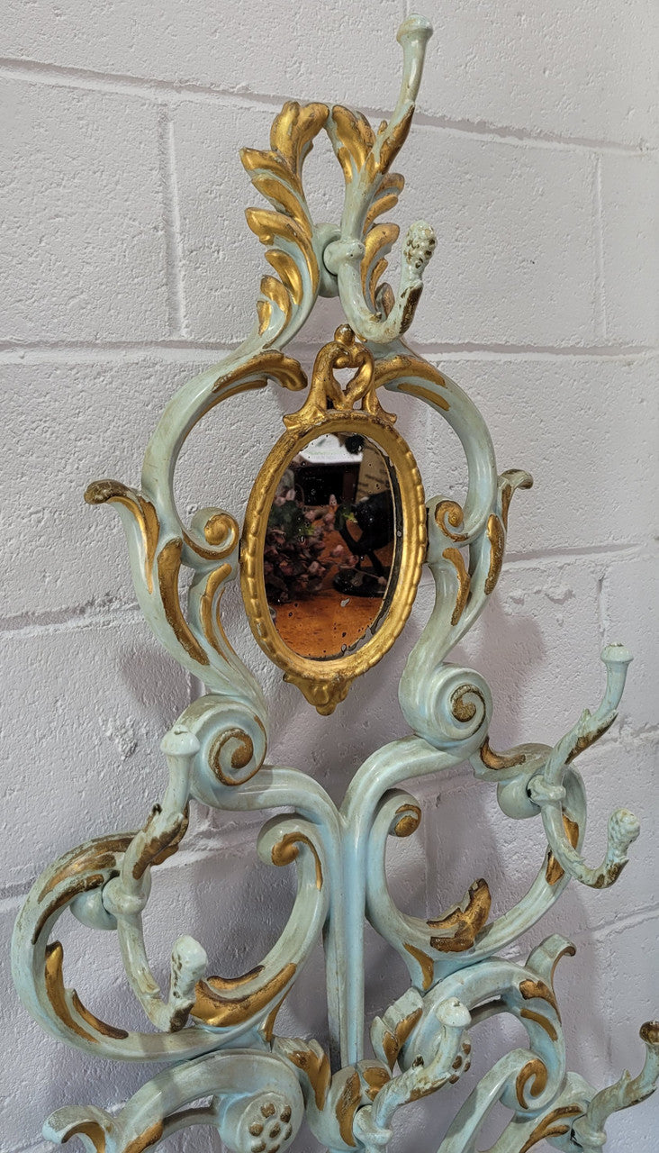 Very attractive 19th Century French cast iron painted and gilded hall stand with original small mirror. Sourced from France and in good original condition.