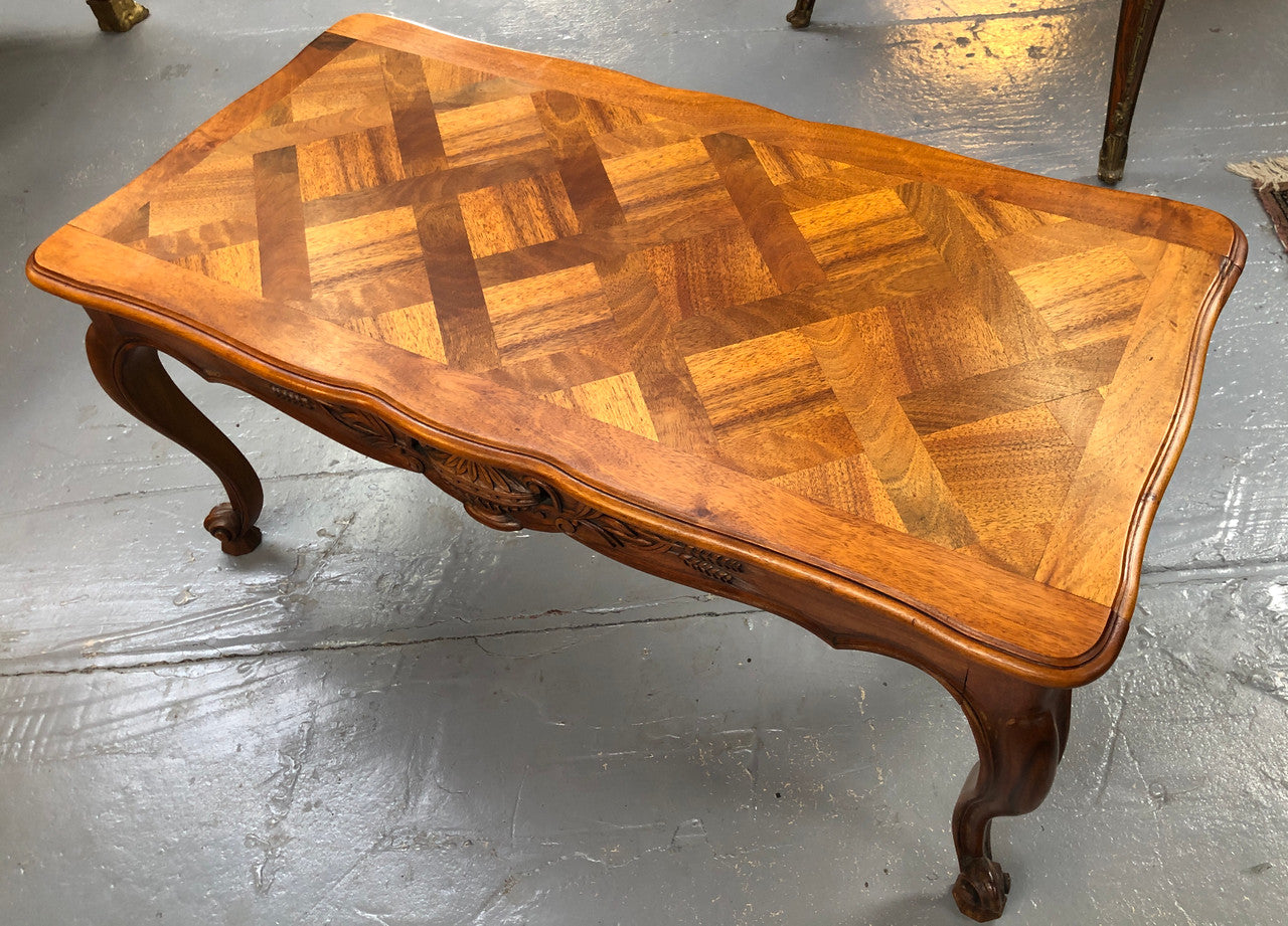 French Walnut parquetry top coffee table. In good original detailed condition. Circa: 1950's