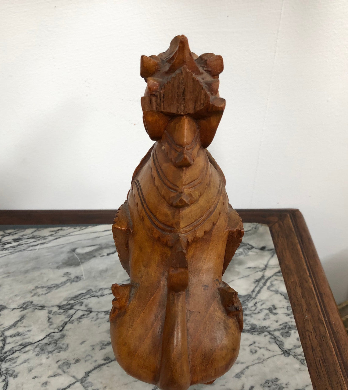 Chinese carved Teak Foo dog with very good detail. In good original condition.