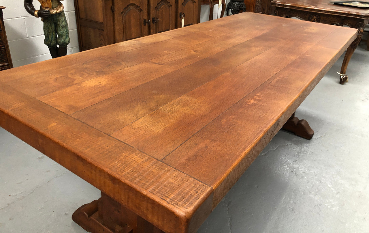 Lovely Oak French Farmhouse table with a thick plank top and lovely stretcher base. Can comfortable seat 8-10 people and is in good original detailed condition.