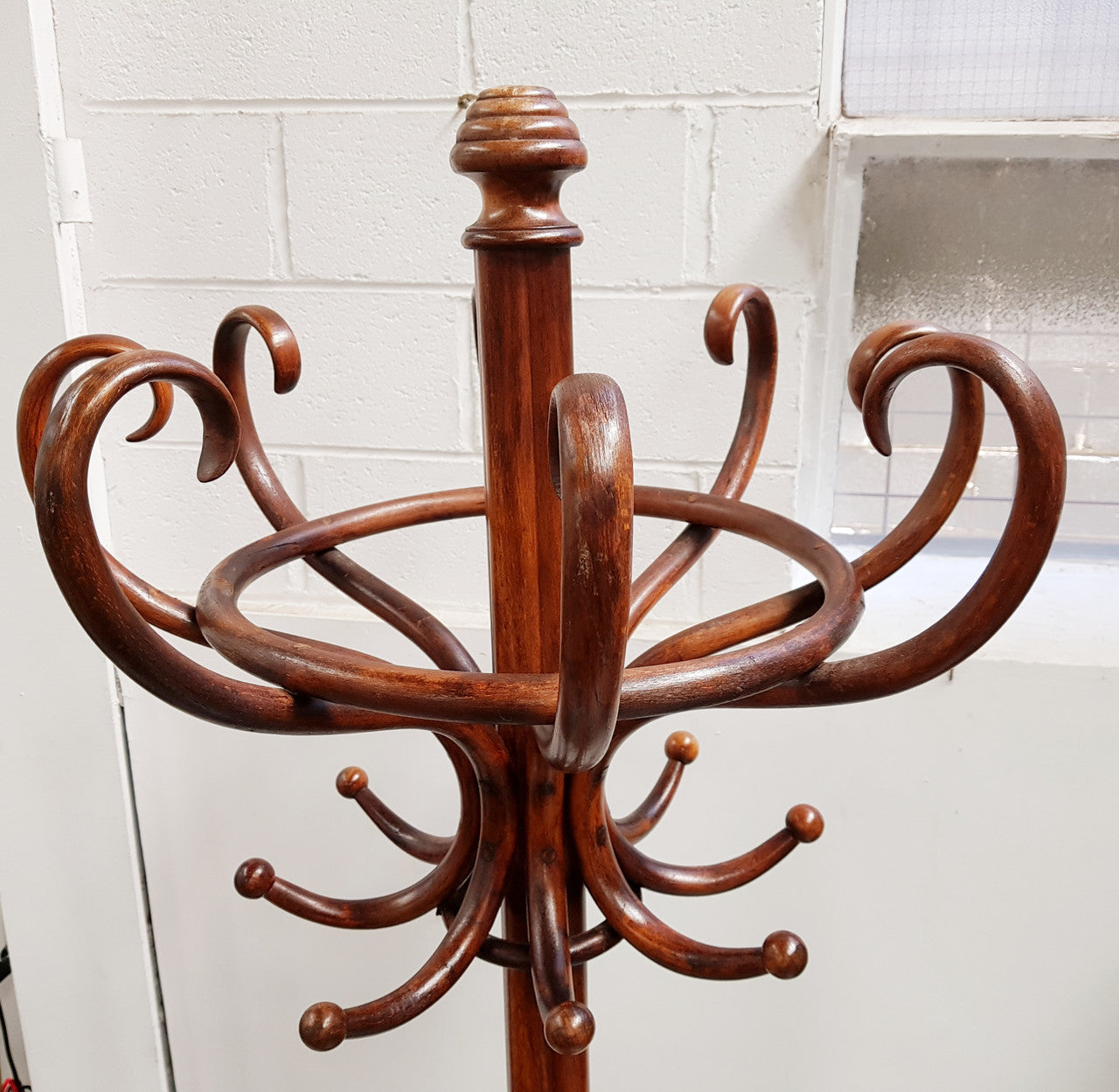 A great example of an Antique French walnut stained Thonet style hat and coat stand in very good restored condition. Very sturdy and solid. Hard to find. Circa 1900.