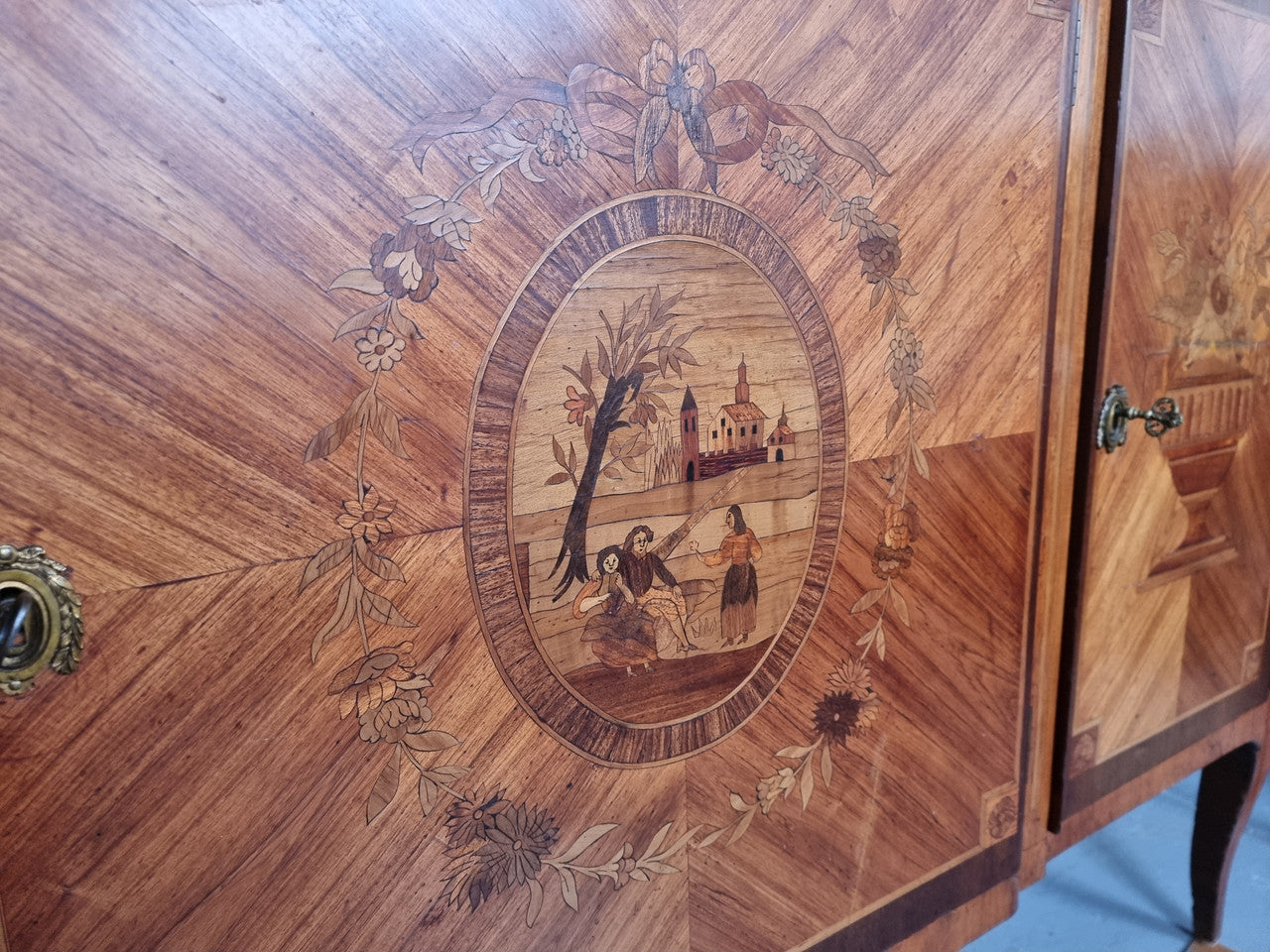 A high quality 19th Century French marquetry inlaid Kingwood marble top credenza. It has an attractive solid marble top and decorative marquetry inlay throughout. It has plenty of storage space with three drawers and three doors. It has been sourced from France and is in good original detailed condition.