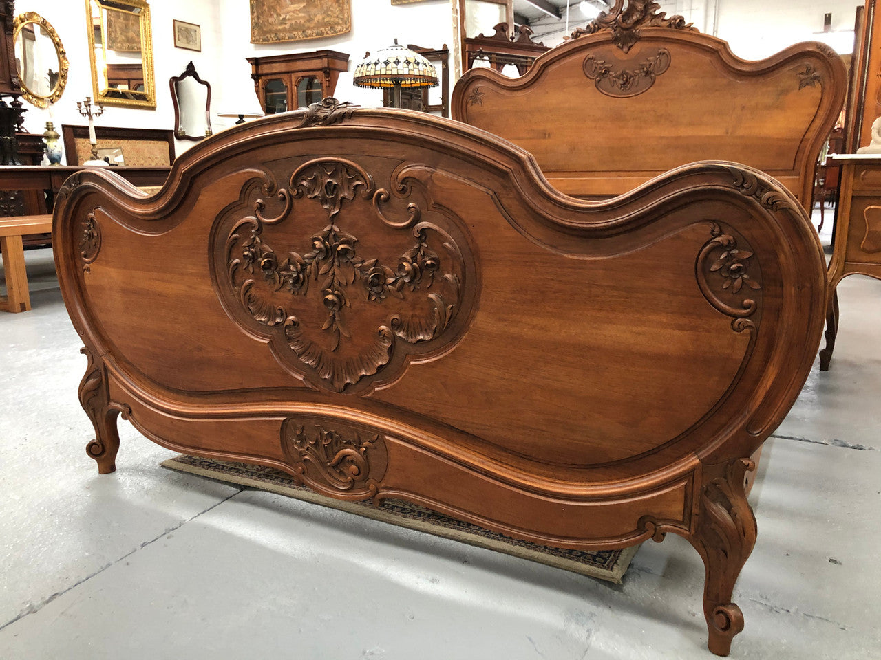 French Walnut Louis XV style queen size bed. Comes with custom made slats, all you need to is place you mattress on top.