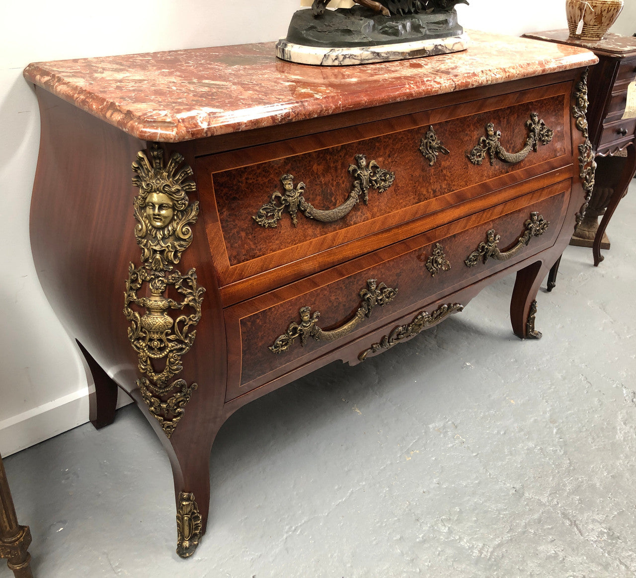 Grande French Louis XIV style Amboyna and walnut two drawer marble top commode, with amazing detailed ormolu mounts, and sienna colour marble top. In good original detailed condition.