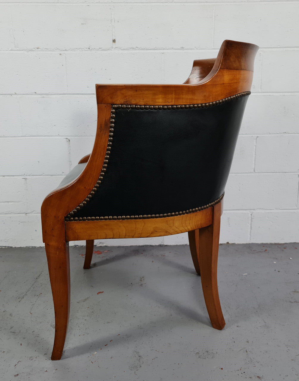Antique Empire style Walnut and leather office desk chair. In good original detailed condition and leather is in good used condition.