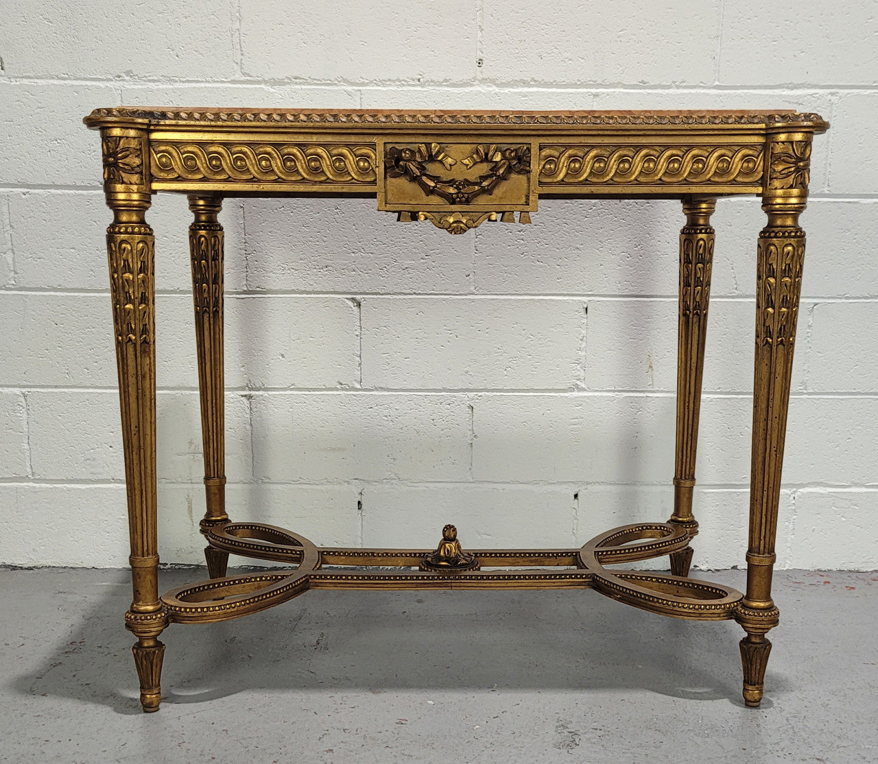Antique French Louis XVI style gilt center table with a stunning marble top. Featuring stunning ornate carving and it is in great original condition. It has been sourced directly from France.