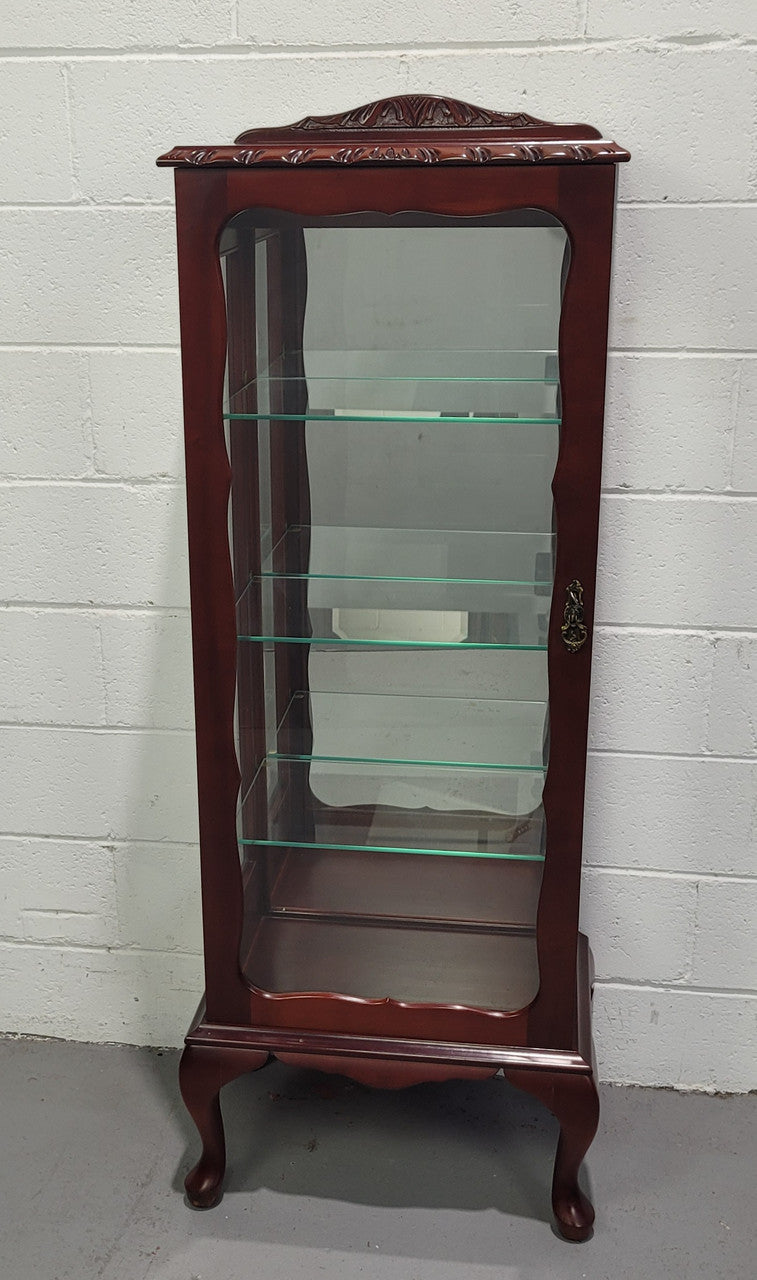 Vintage Mahogany petite display cabinet with three solid glass shelves. Ideal for a small area and is in good original detailed condition.