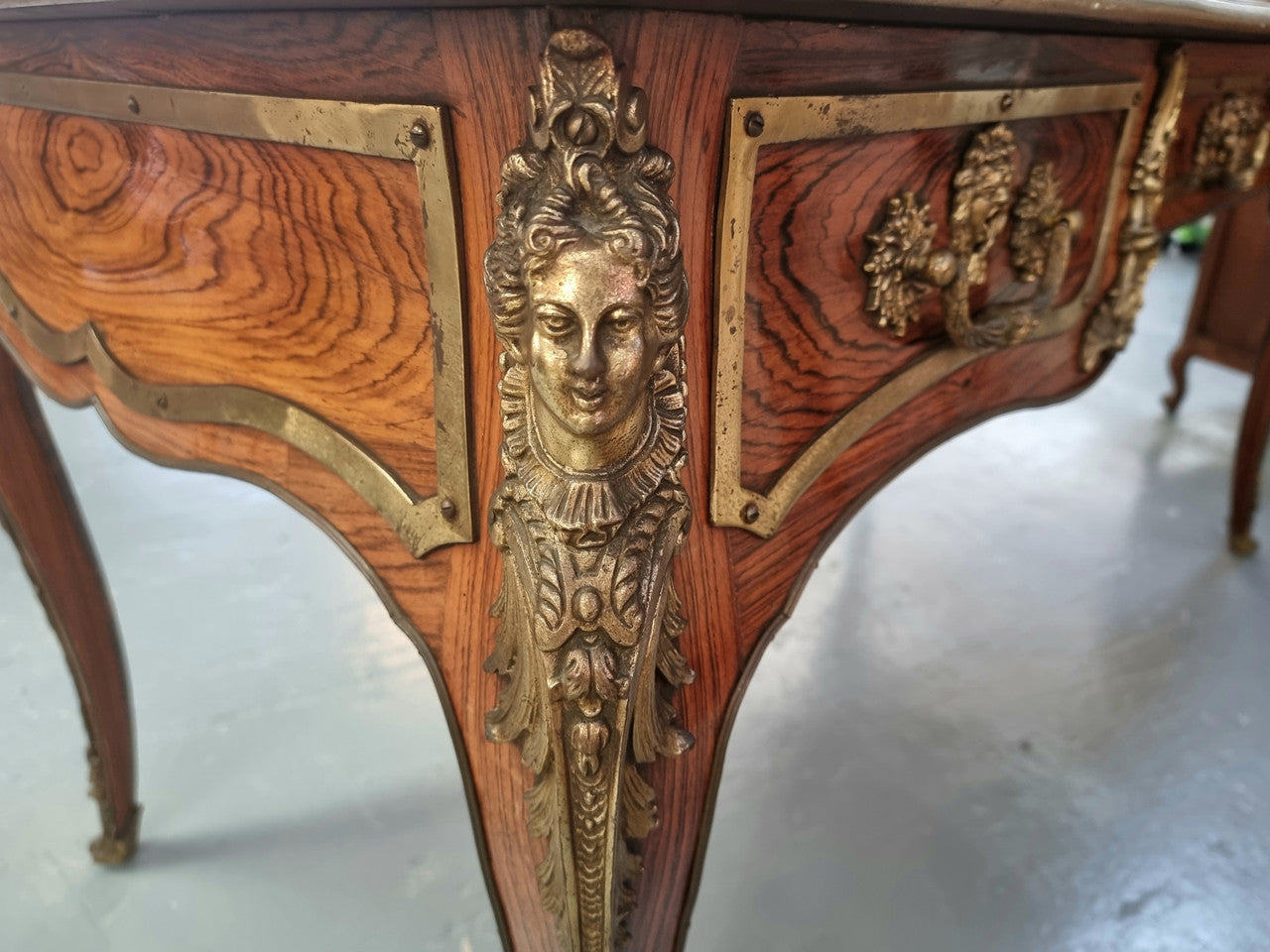 Beautifully fully restored French Antique Rosewood partners desk with beautiful ormolu detail and lovely tooled new leather top. There are three functioning drawers on one side for all your storage needs.