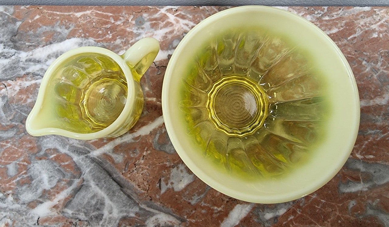 A fabulous rare Vaseline glass small jug and sugar bowl in good original condition.