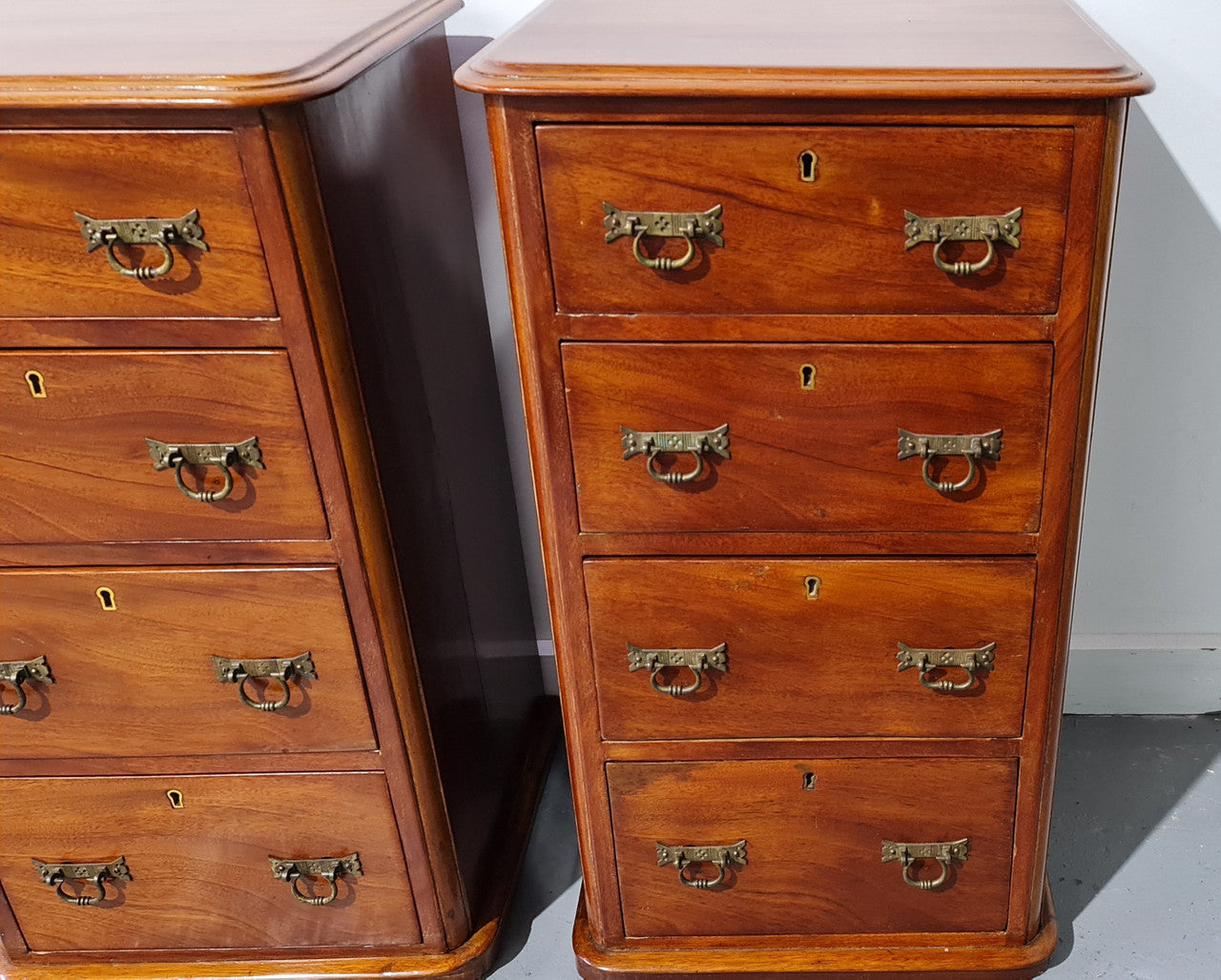 Pair of English Victorian Mahogany bedside drawers. In good original detailed condition.