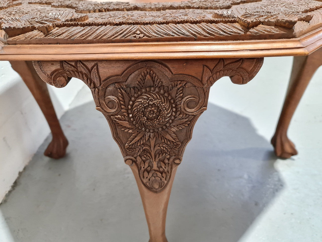 Heavily carved Teakwood round Chinese coffee table. In good original detailed condition. Circa: 1920