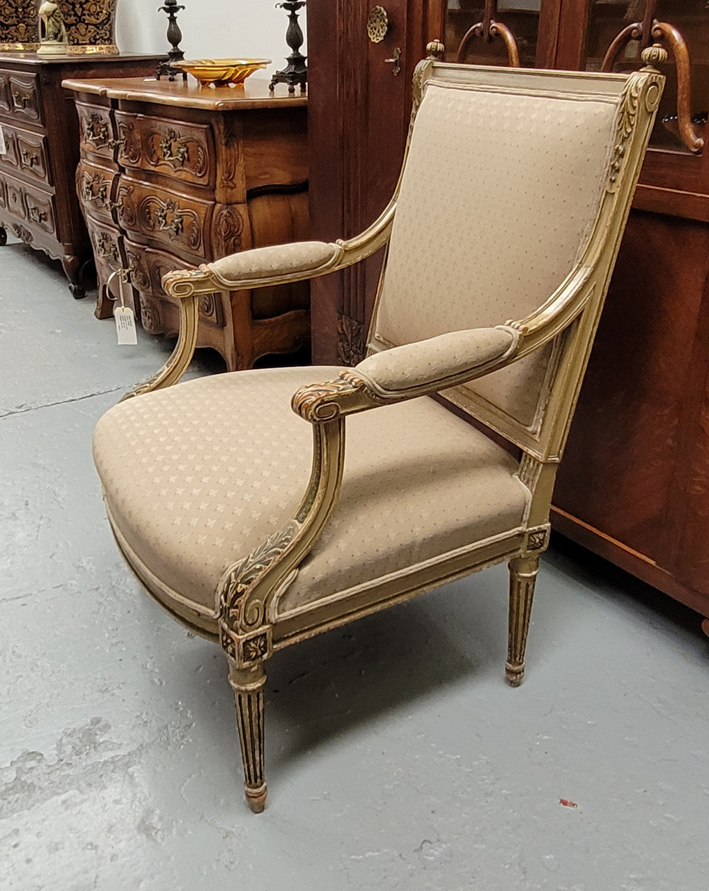 Louis XV style painted Fauteuil chair with attractive fabric upholstery. It has been sourced from France and is in good original detailed condition. The upholstery is in very good used condition, please view photos as they help for part of the description.