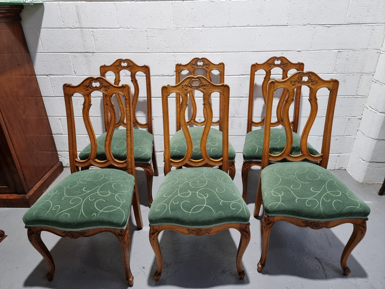 Set of six French style Oak decorative upholstered seat dining chairs. They are comfortable to sit in and are in good original condition, please view photos of fabric as the fabric is in good used condition.