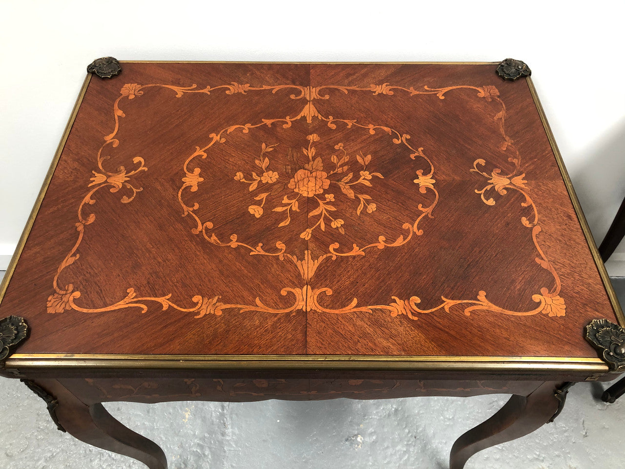 Beautiful french inlaid games table which includes internal drawers and bronze mounts. Internal drawers have counters and cards included.
