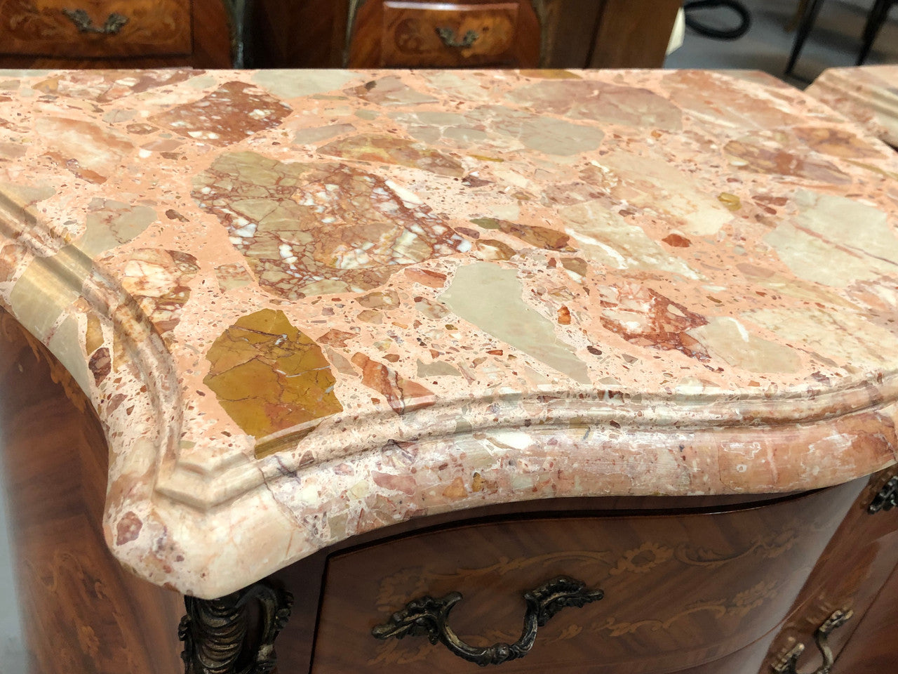 Rare Pair of French miniature commode bedsides with beautiful marquetry inlay & ormolu mount. Circa 1950's and are in very good condition.