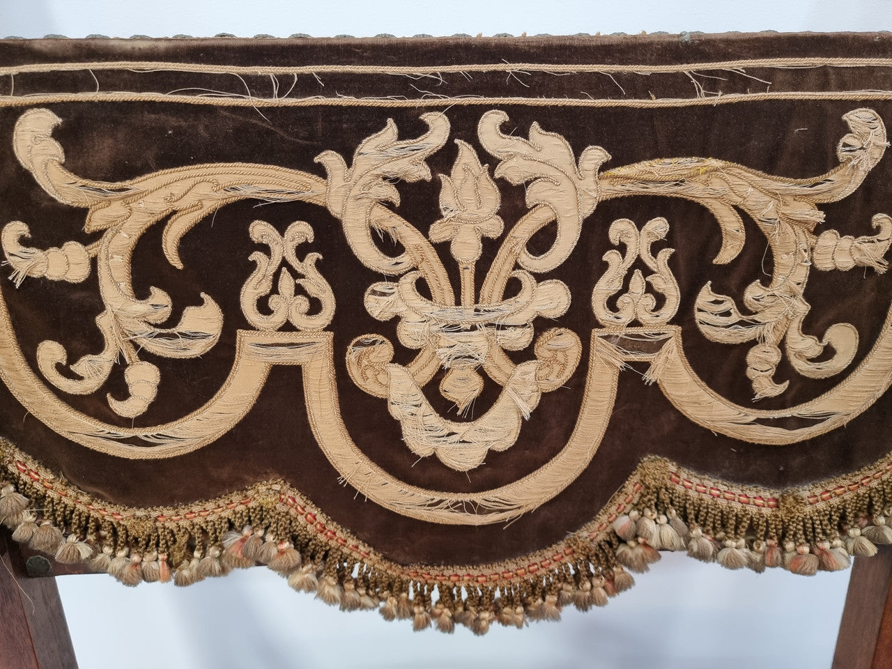 Beautifully carved Walnut Egyptian Revival armchair with amazing hand sewn Stumpwork embroidery coverings. In good original detailed condition.
