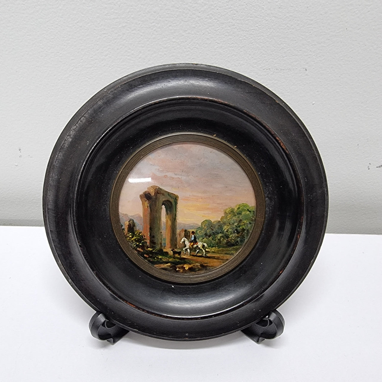 Lovely Victorian hand painted miniature landscape. Please note stand is not included. It is in good original condition and has been sourced locally. Please view photos as they help form part of the description.