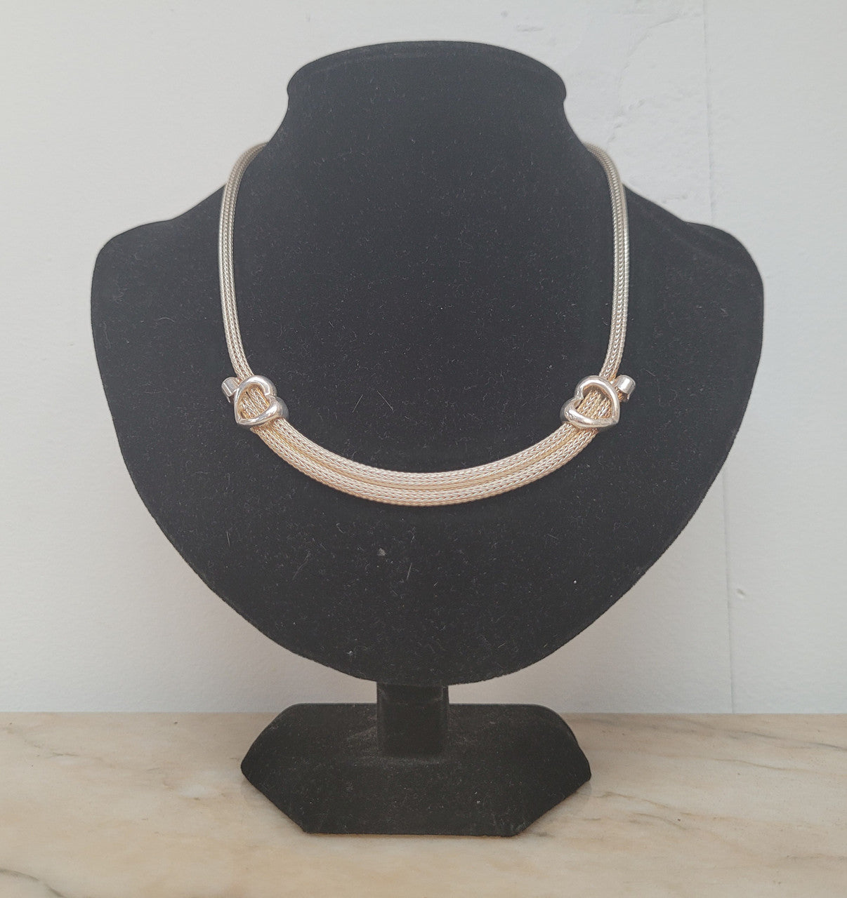 Beautiful Italian sterling silver woven double heart necklace. In good condition.