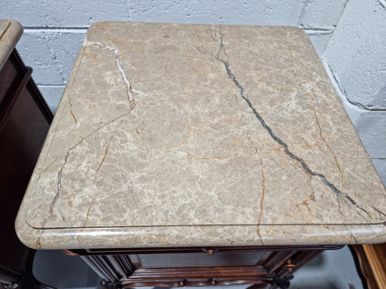 Pair of elegant Louis XV style marble top walnut bedside cabinets. One drawer and one cupboard. Circa 1900 in good original detailed condition.