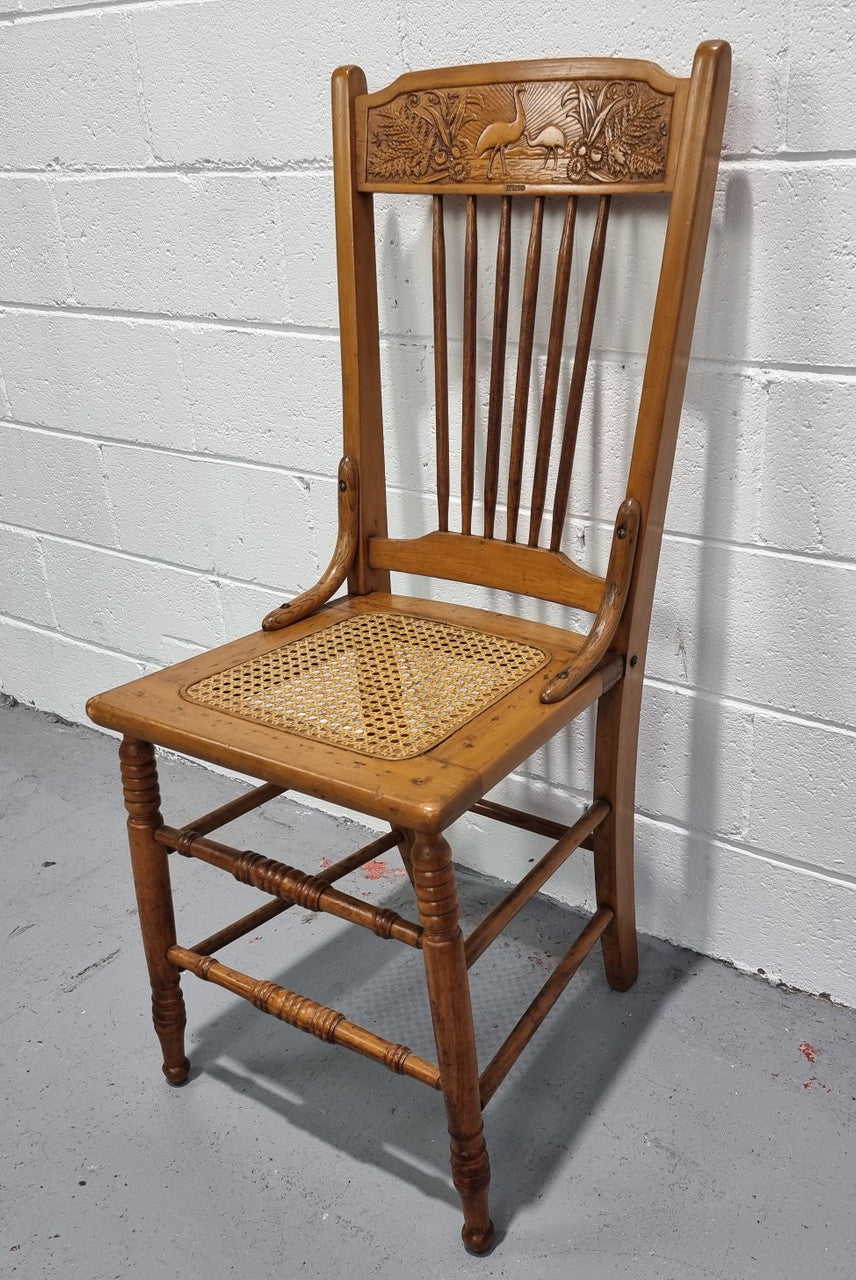 Australian Emu chair with cane inset seat. In good original condition.