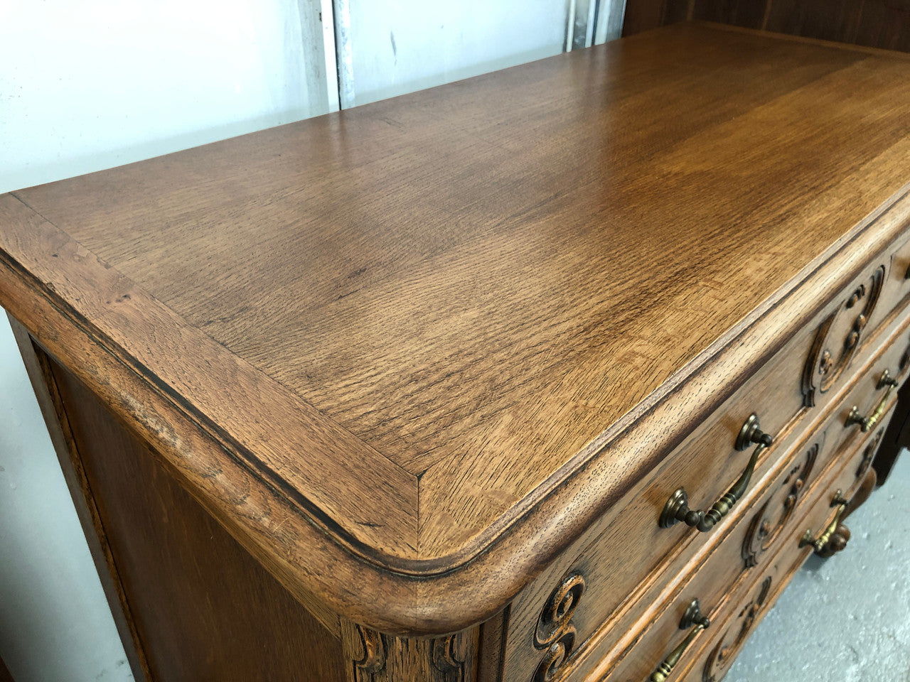 French nicely carved Oak chest of three drawers. In good original detailed condition.