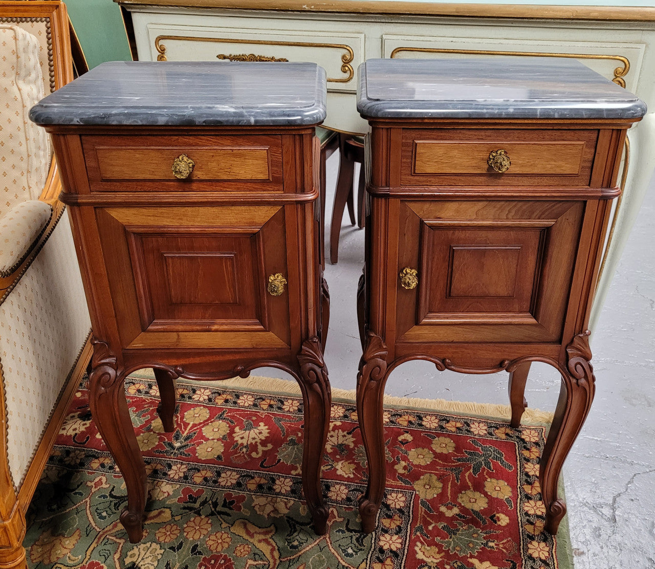 Pair of Walnut Louis XV style grey marble top bedside cabinets. Single drawer, one cupboard and lovely French cabriole legs. They have been sourced from France and are in good original condition.