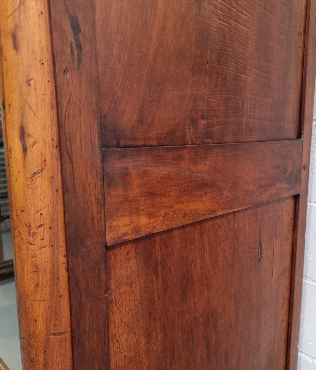 Grand French Mahogany Empire two door bookcase. It has beautiful glass doors and has three fully adjustable shelves. It has been sourced from France and is in good original detailed condition.