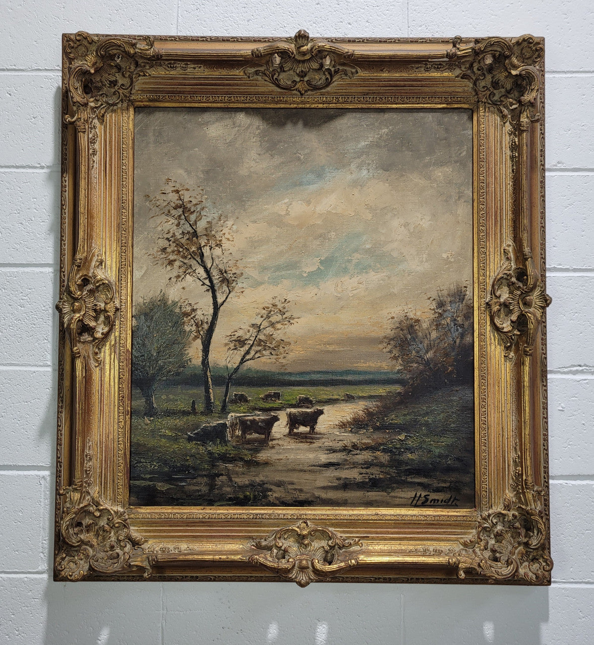 A stunning painting sourced in France signed oil on canvas of "Cows In River Landscape". Framed in a magnificent gilt frame and is in good original detailed condition.