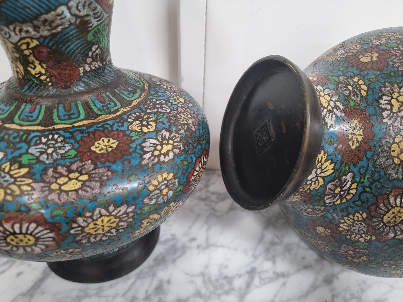 Beautiful pair of Early 19th Century Bronze and Cloisonné vases in good original condition. The base displays the seal marks.