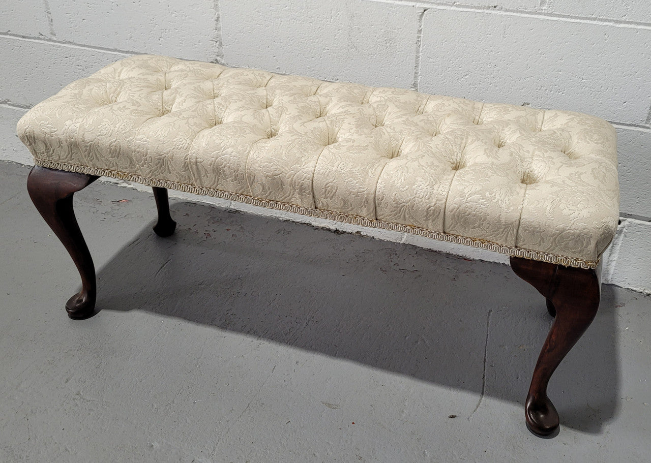 Vintage neutral upholstered buttoned stool. Fabric is in good used condition, please view photo's has they help form the description. The stool its self is in good condition.