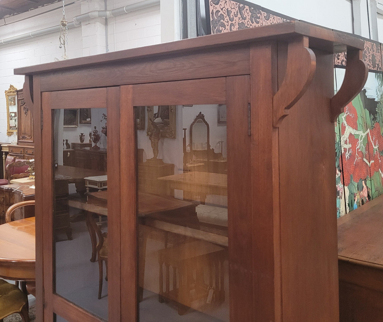 Beautiful two door Blackwood bookcase with glass doors and with four fully adjustable shelves. It is in good original detailed condition.