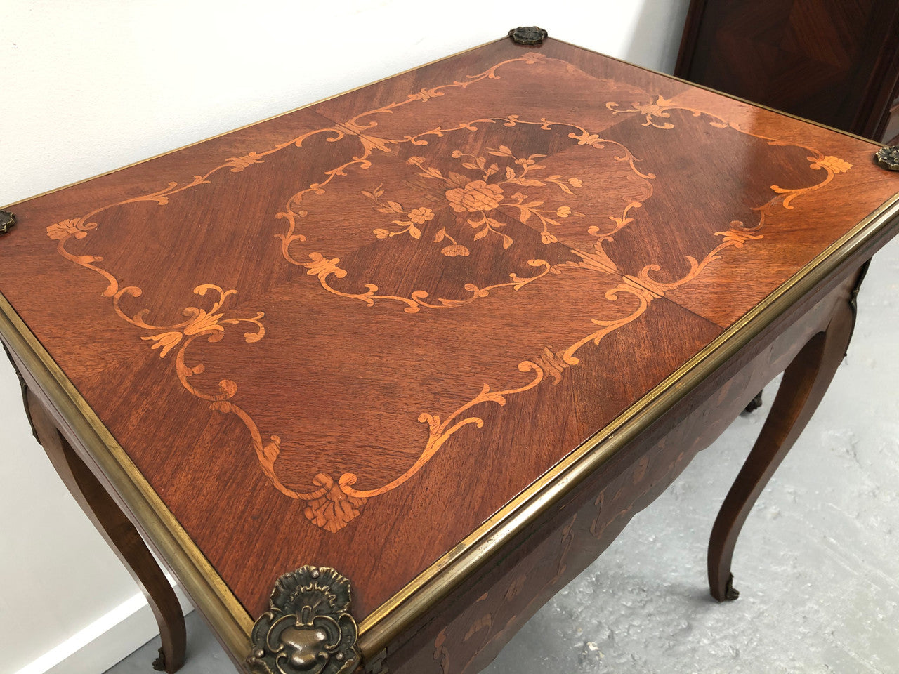 Beautiful french inlaid games table which includes internal drawers and bronze mounts. Internal drawers have counters and cards included.