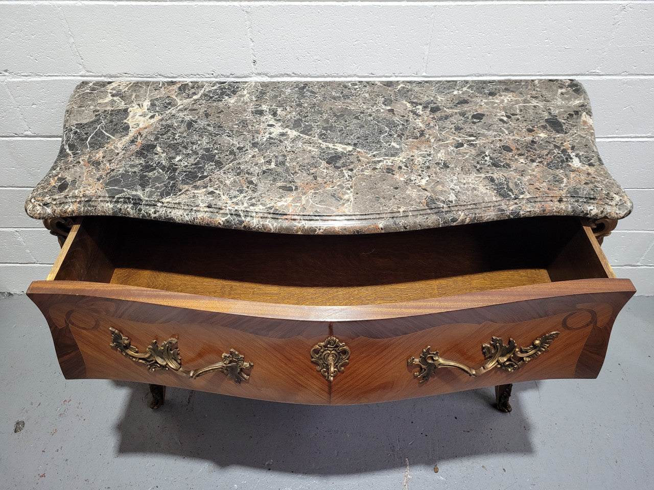 Stunning French Walnut and Rosewood Louis XV style two drawer commode with a beautiful marble top and ormolu mounts. In good original detailed condition.