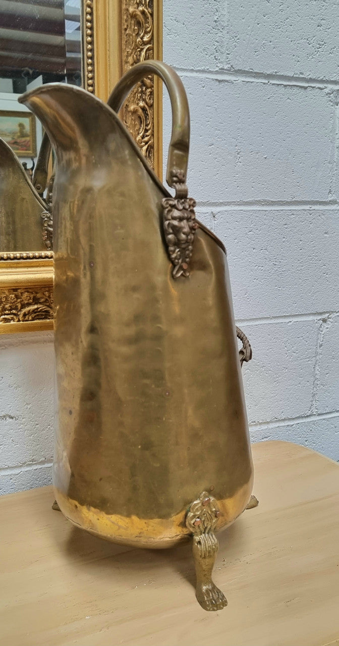 French brass coal bucket with Lion heads. In good original condition.