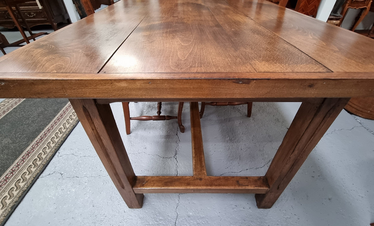 Fabulous French Cherrywood farmhouse dining table with a stretcher base and would easily sit 10 people comfortably in fantastic condition.