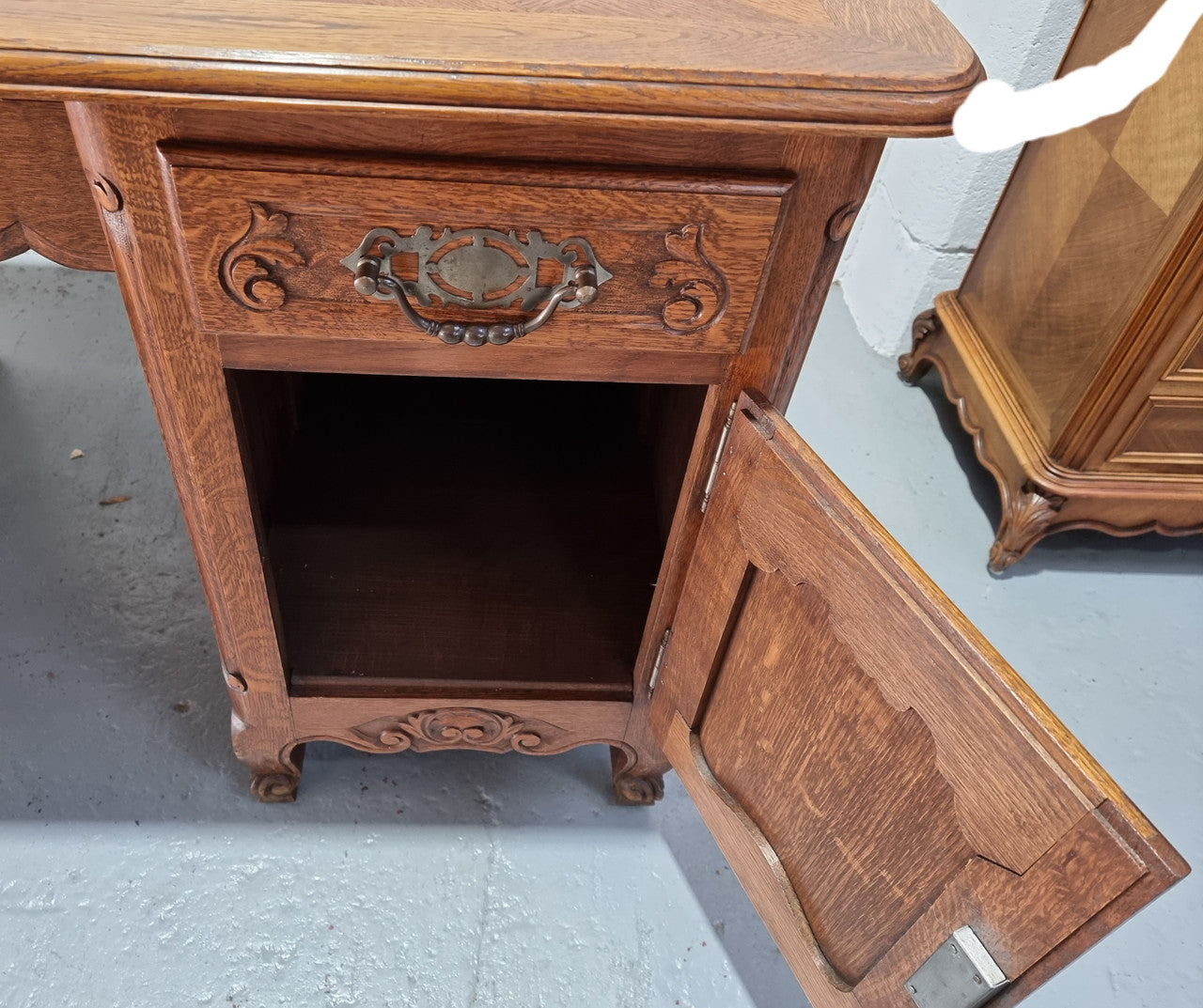 Beautifully carved french oak, faux partners desk with a lovely parquetry top and 6 drawers and 1 cupboard . In good original condition.