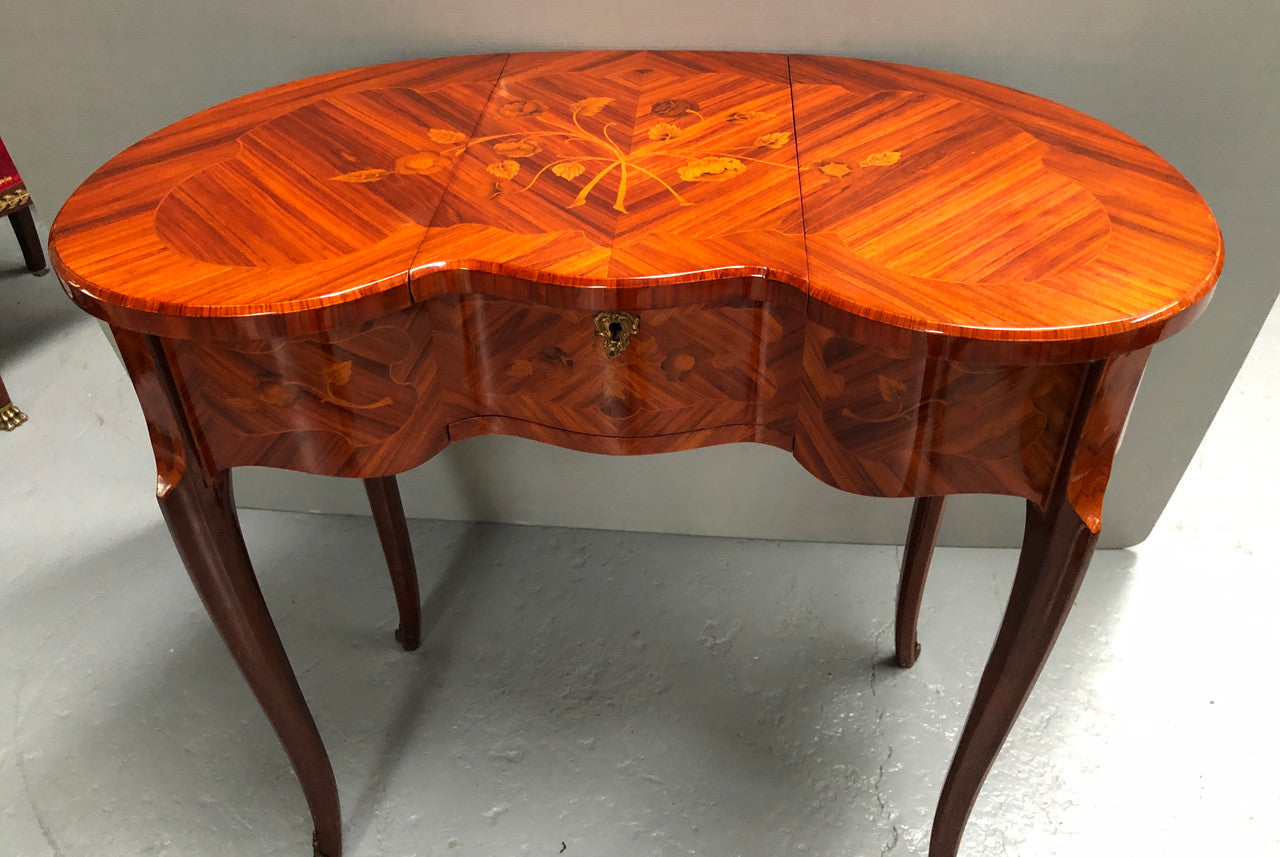 French Mahogany hidden dressing table with beautiful marquetry inlay. In good restored condition. Circa: 1950's