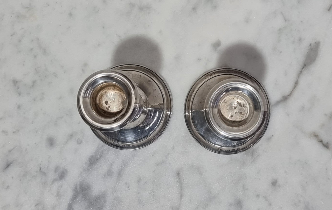 Pair of Birmingham sterling silver candlesticks date marks 1967. In good original condition, please view photos as they help form part of the description.