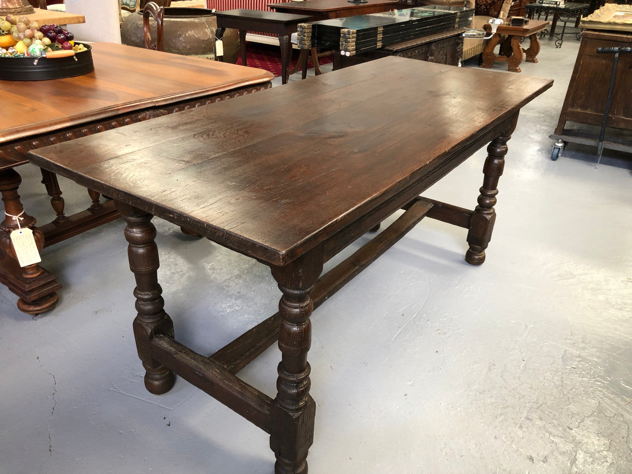 Early 19th Century French Oak petite size dining table. It seats six comfortably and would be ideal for an area with limited space. In very good original detailed condition.