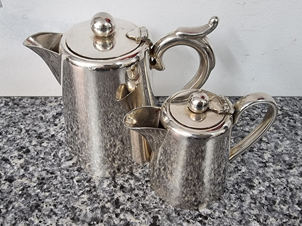 Pair of Vintage Silver-Plate water and milk jug. In good condition please view photos as they help form part of the description.