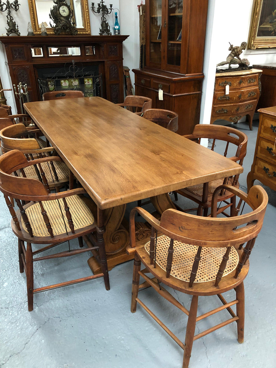 French oak fixed farmhouse table with a charming harp-shaped base. In good original condition and can seat 6-8 people. Circa 1930.