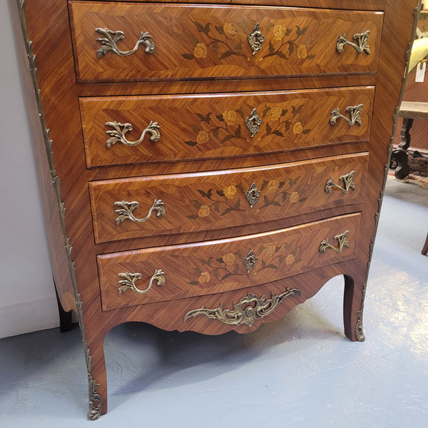 An amazing 1930's Louis XV style walnut and kingwood marquetry inlaid marble top semainier chest with seven generous sized drawers. This beautiful piece has been fully restored and is in great condition.