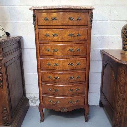 Lovely Louis XV style seminar with a beautiful marble top and decorative ormolu mounts. From circa 1930's and has been fully restored.