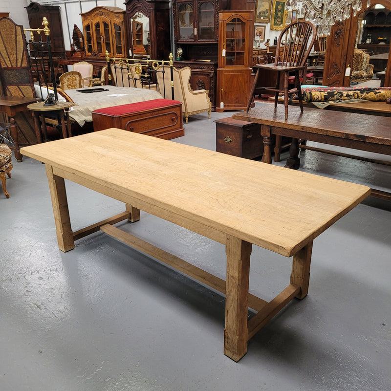 Raw solid Oak French farmhouse dining table that can comfortably sit eight people. It has been sourced from France and is in good original condition.