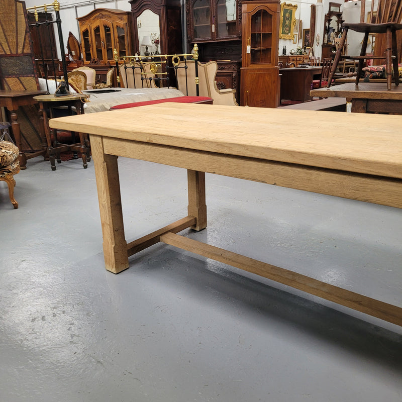 Raw solid Oak French farmhouse dining table that can comfortably sit eight people. It has been sourced from France and is in good original condition.