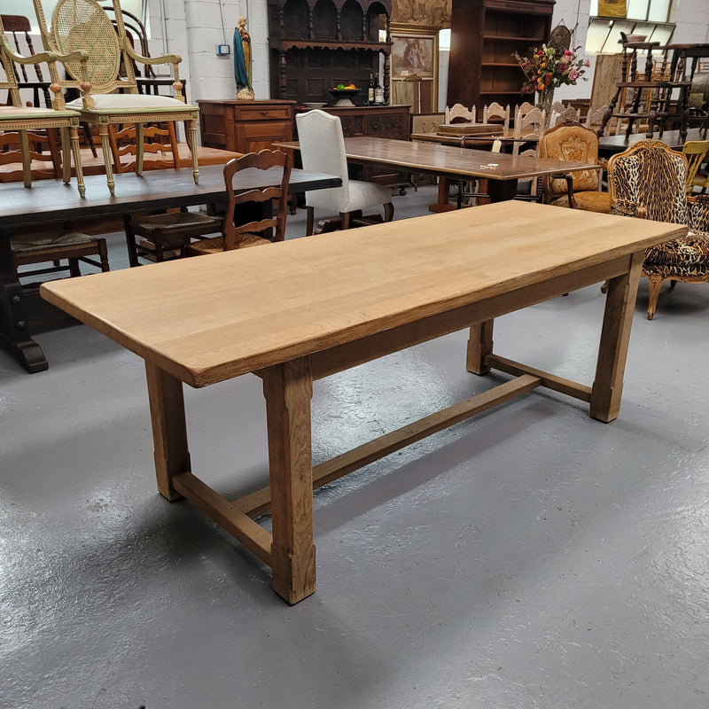 Raw solid Oak French farmhouse dining table that can comfortably sit eight people. It has been sourced from France and is in good original condition.