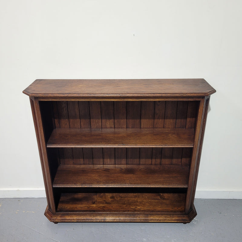 Stunning and hard to find French Oak open bookcase with 2 shelves, it is also in great original detailed condition.  Please view photos as they form part of the description.